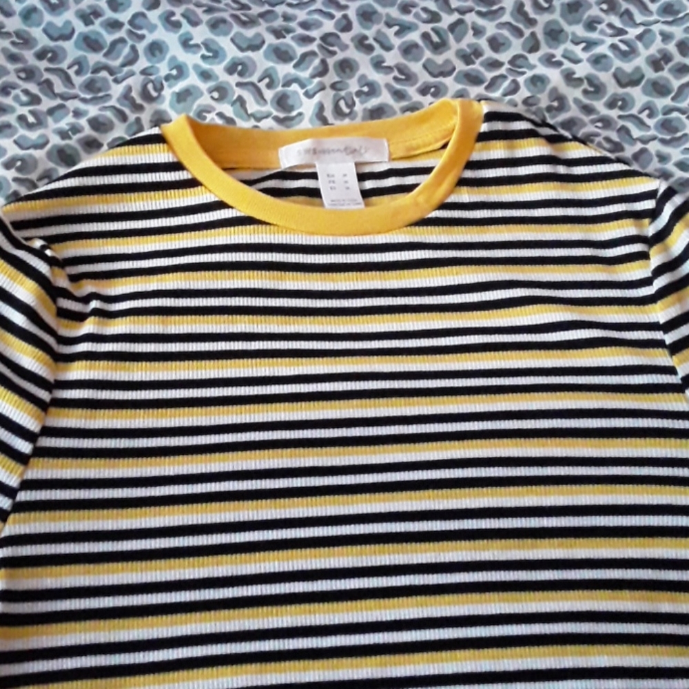 A Yellow, White and Black Long Sleeve Top